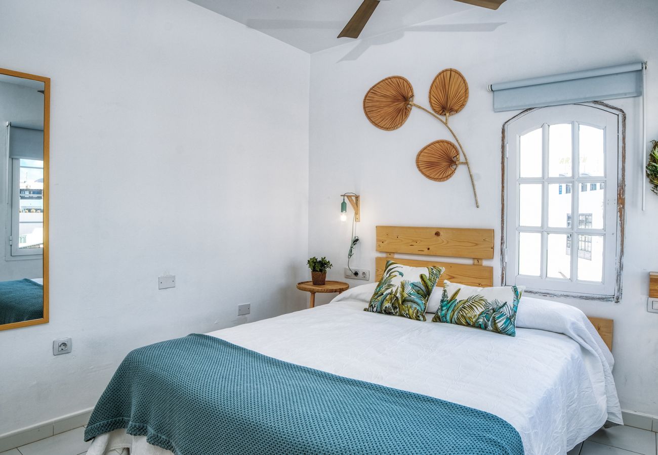 Apartamento en Puerto del Carmen - Chez Carmen - Coqueta y moderna casa con vistas al mar, piscina y WIFI con fibra