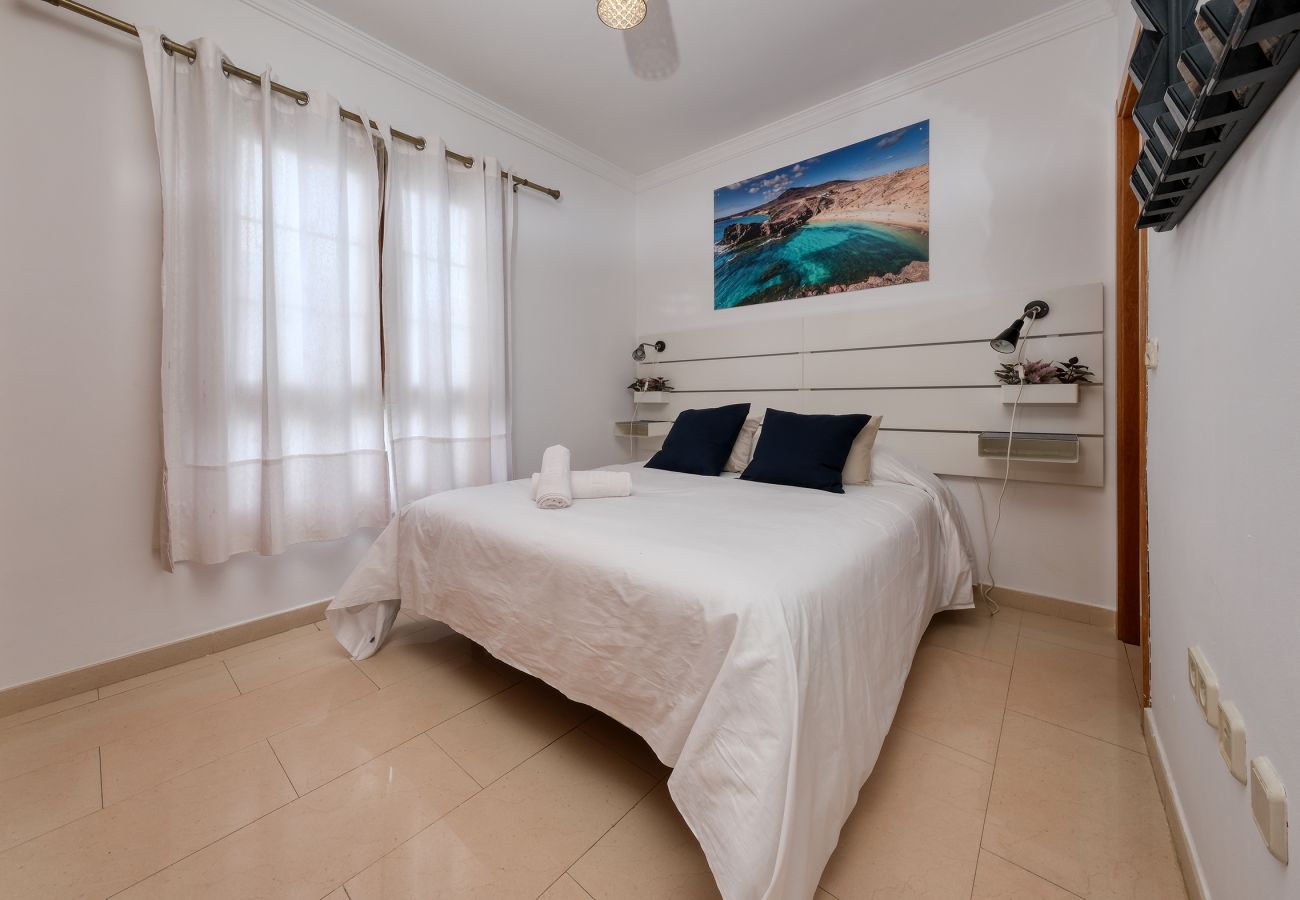 Villa en Playa Blanca - Villa Flavia, piscina privada, jacuzzi, sala de juegos y vista al mar. ECO