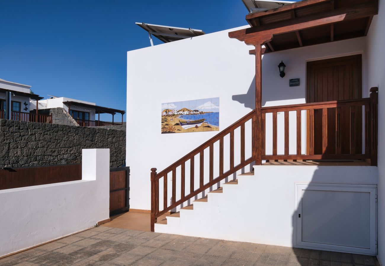 Villa en Playa Blanca - Villa Flavia, piscina privada, jacuzzi, sala de juegos y vista al mar. ECO