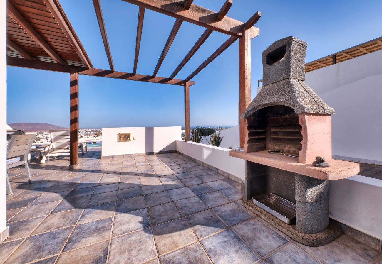 Casa en Playa Blanca - casa Lava and Sea - piscina privada, vistas al mar