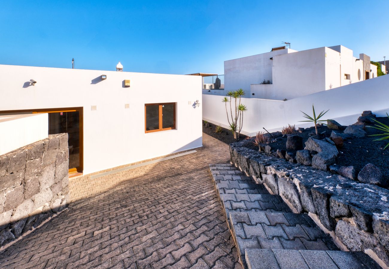 Casa en Playa Blanca - casa Lava and Sea - piscina privada, vistas al mar