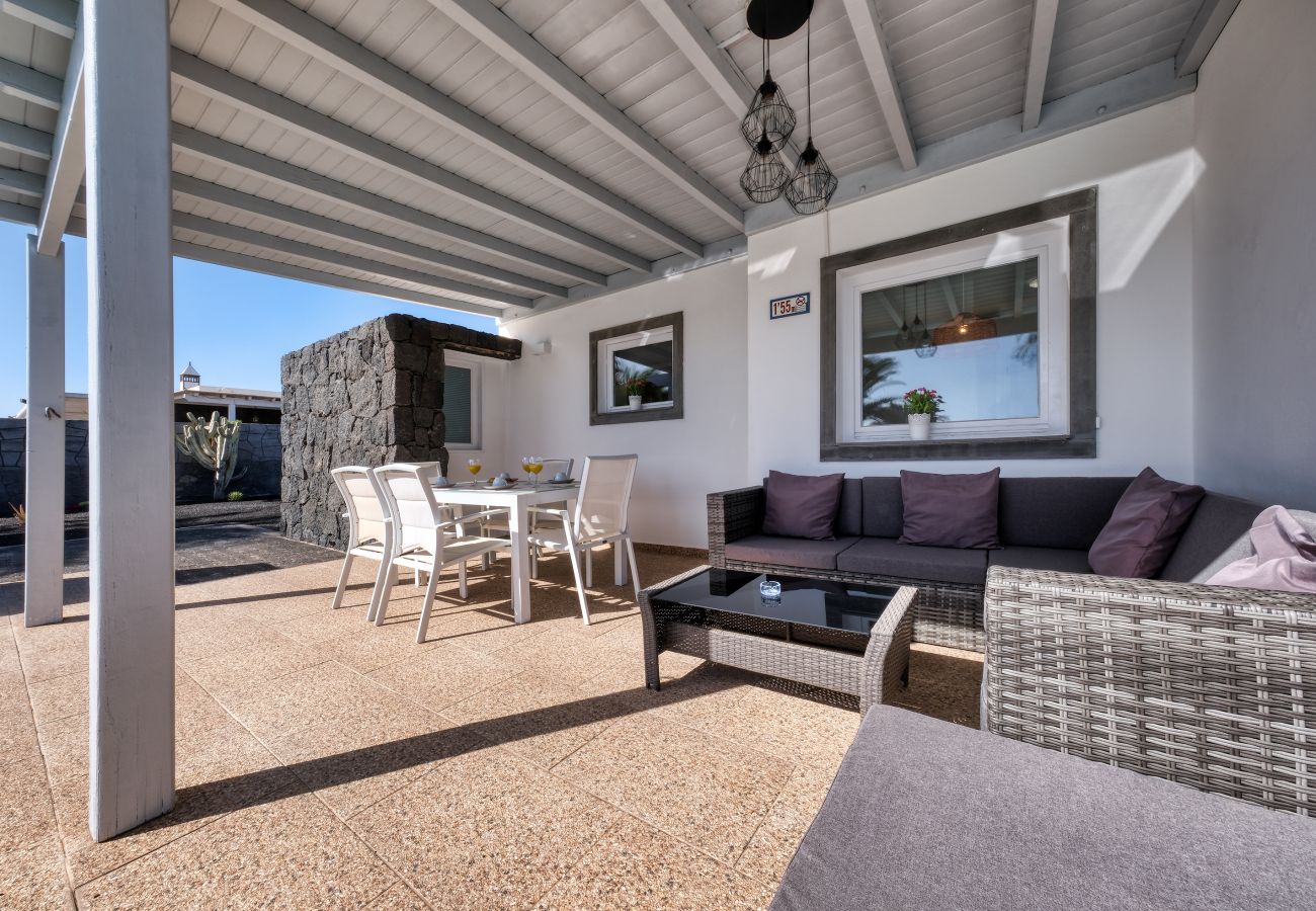 Casa en Playa Blanca - Blue Waves House con piscina climatizada, barbacoa, bicicletas 