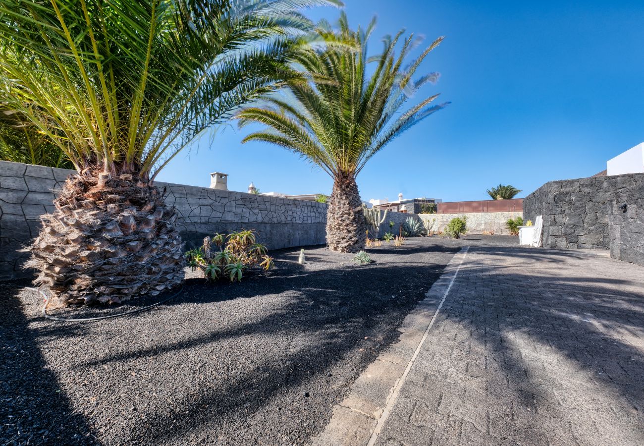 Casa en Playa Blanca - Blue Waves House con piscina climatizada, barbacoa, bicicletas 