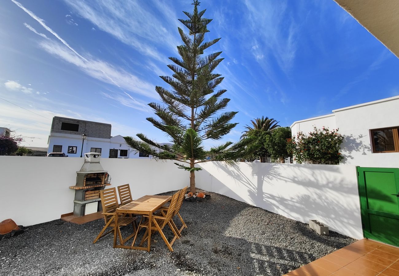 Alquiler por habitaciones en Tinajo - Casa NoPasaNada: habitación La Palma con baño privado 