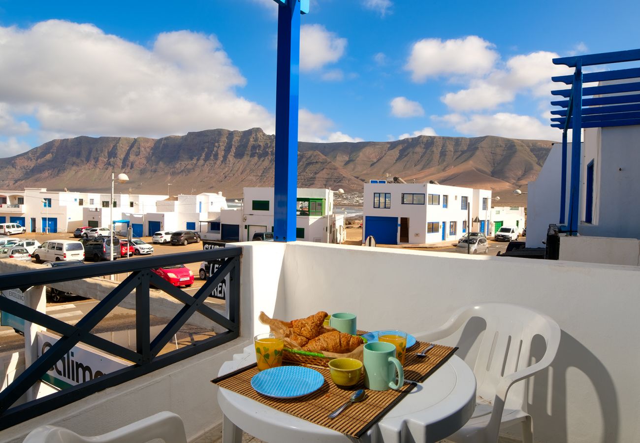 Ferienhaus in  Famara - Casa Hespi-Blick auf den Famara-Strand