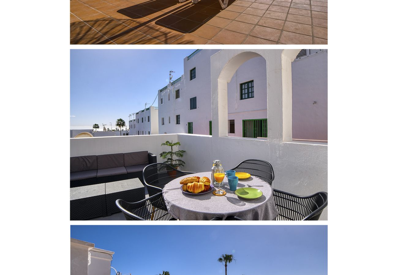 House in Puerto del Carmen - Sea Waves Lanzarote - Large terrace, community pool, WiFi with fiber