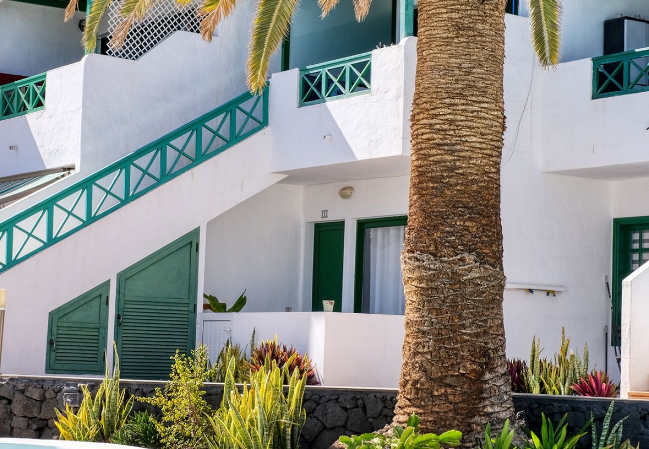 Appartement à Puerto del Carmen - Chez Carmen - Maison moderne et confortable avec vues sur la mer, piscine et WIFI par la fibre