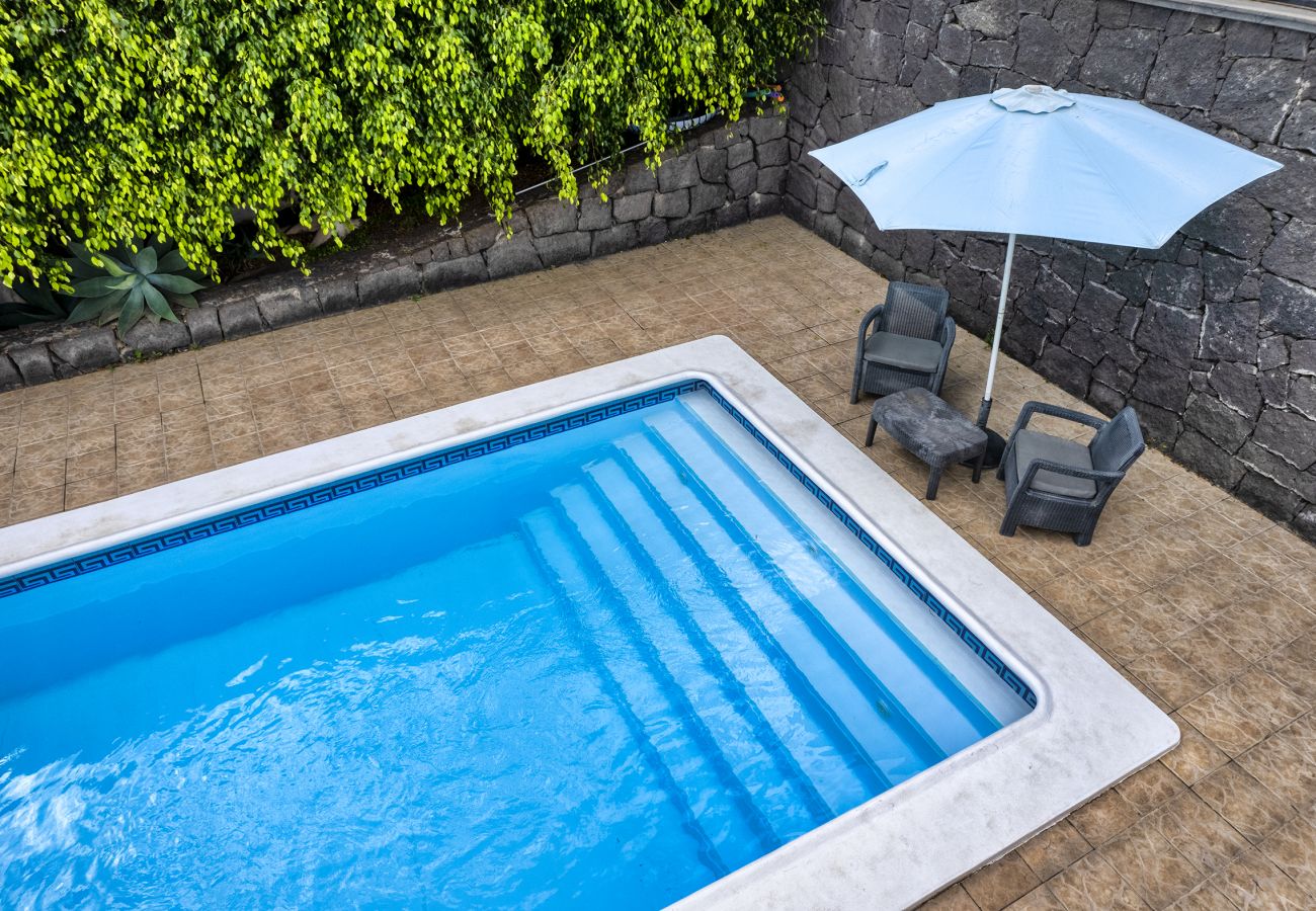 Maison à Tías - Maison Paraiso avec piscine privée, vue sur l’océan et climatisation