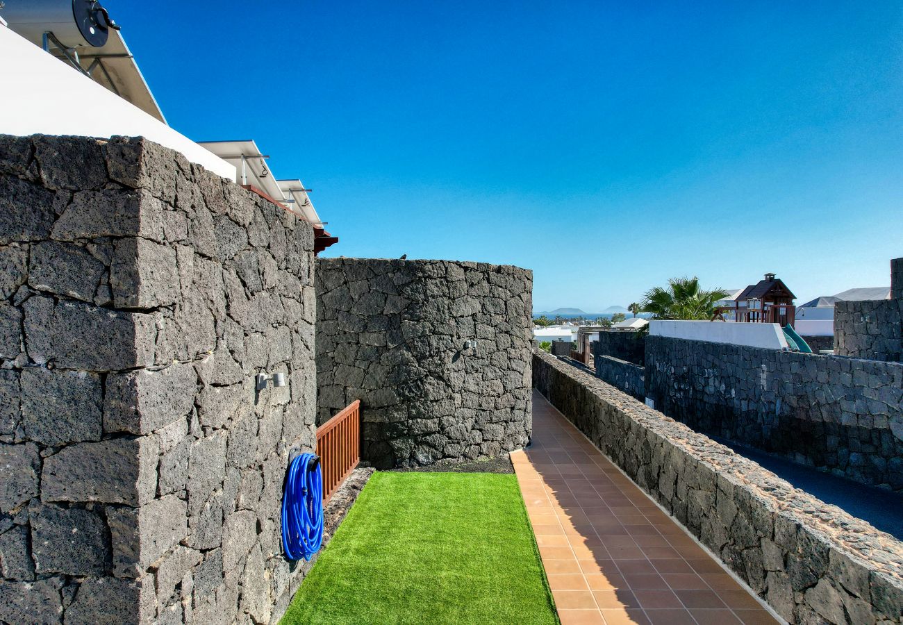 Villa à Playa Blanca - Villa Flavia, piscine privée, jacuzzi, salle de jeux et vue sur la mer. ECO