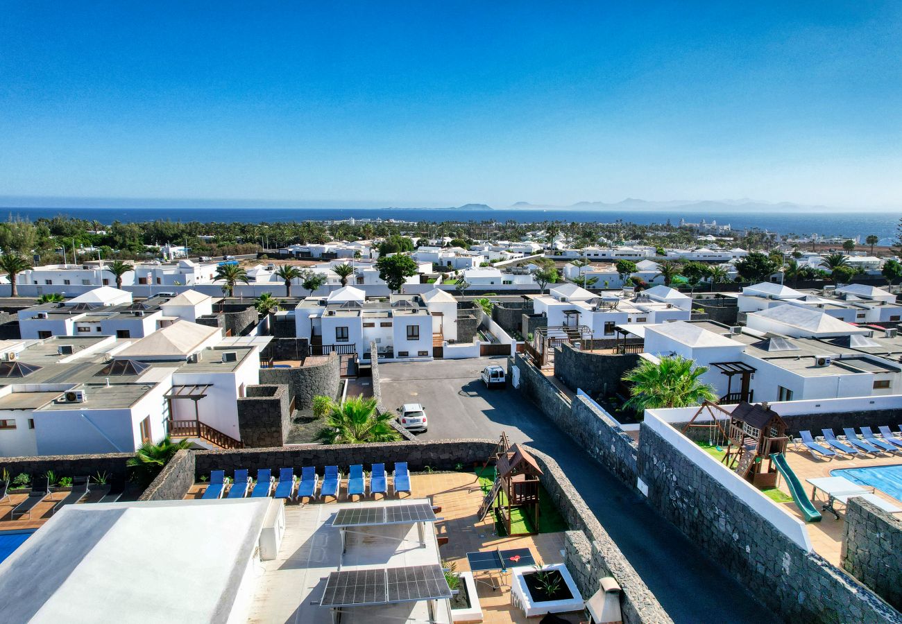 Villa à Playa Blanca - Villa Flavia, piscine privée, jacuzzi, salle de jeux et vue sur la mer. ECO